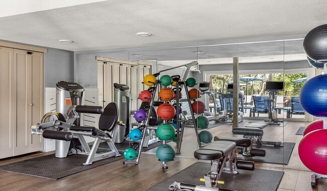 Stay active with a fully equipped fitness center right at home. - Arcadia Apartment Homes