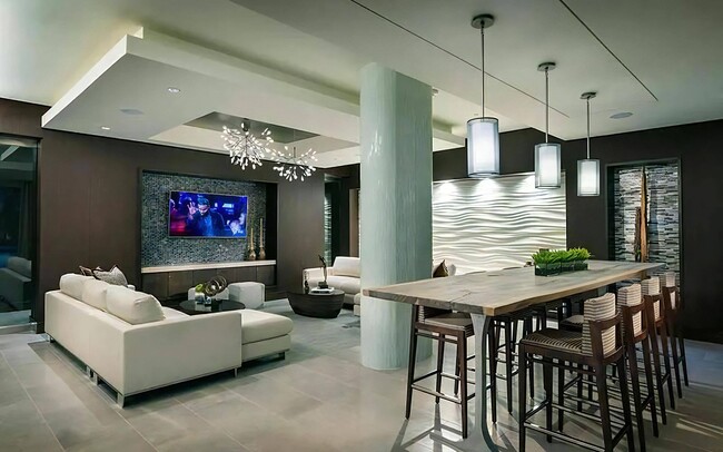 Clubhouse Lounge With Sofa Seating and Bar-Height Dining Table - Tens on West