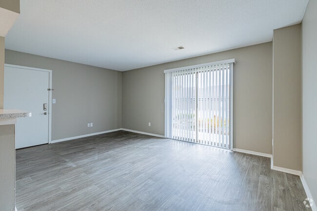 2BR, 1BA - 848SF - Manhattan - Living Room - Hamptons of Cloverlane Apartments