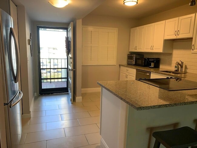 Building Photo - 4120 Tivoli Ct Unit 305