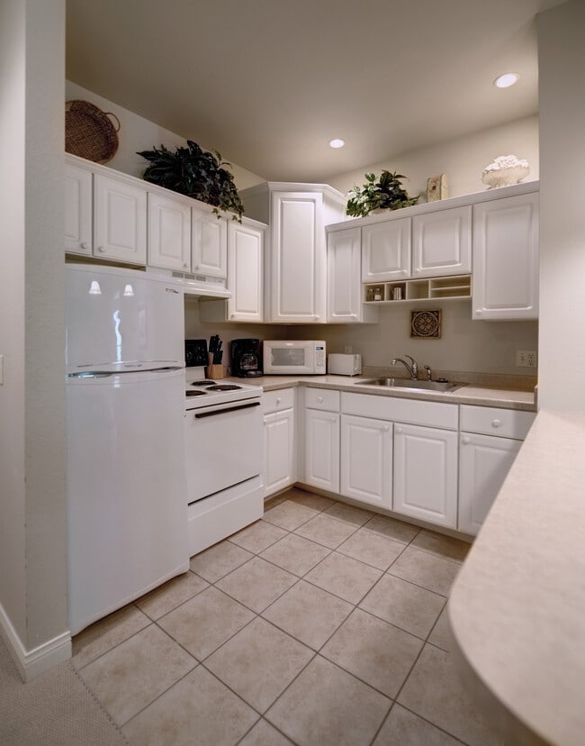 Furnished Kitchen - The Apartments at Corporate Cove