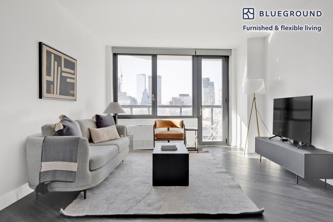 Building Photo - 250 E Houston St Unit FL7-ID180