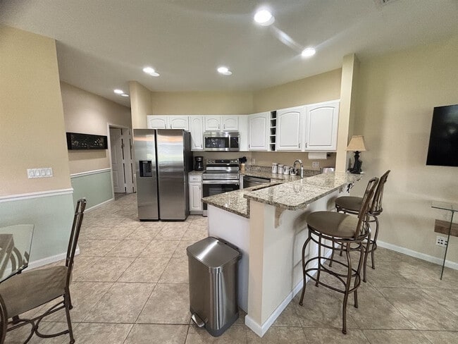 Photo - 8332 Mulligan Cir Unit SI FL2-ID1586079P