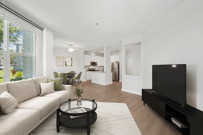 Renovated Package I living room with hard surface flooring - Avalon Fremont