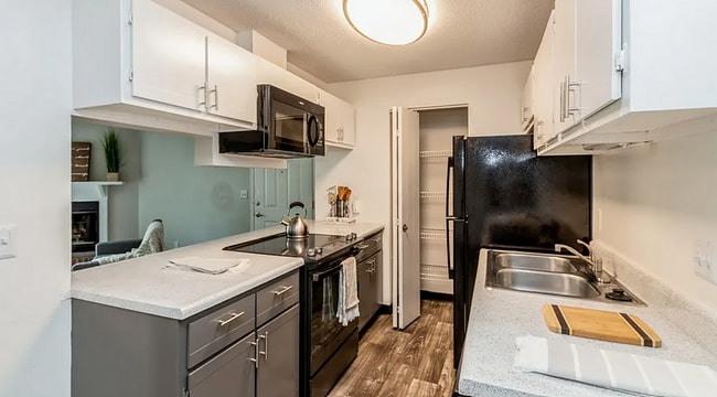 Kitchen with Black Appliances - ReNew Cross Creek