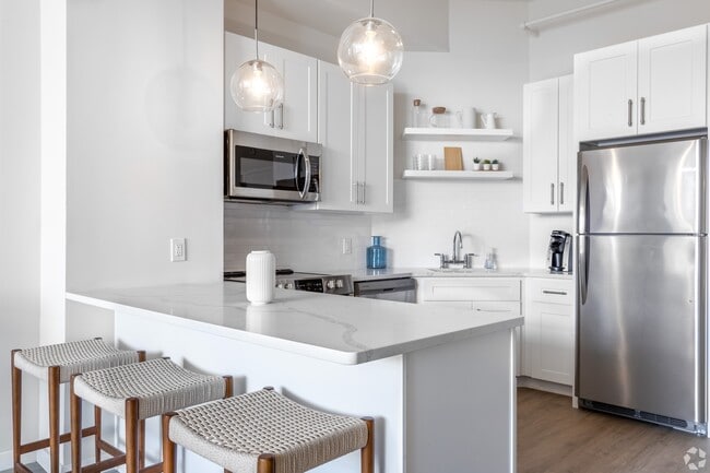 Welcome to Luckey Platt, where modern design meets comfort. This stylish kitchen boasts sleek appliances, a spacious layout, and elegant finishes, perfect for culinary enthusiasts. Upgrade your living experience today—schedule a tour! - Luckey Platt