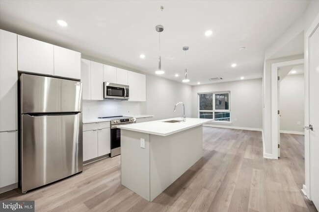 Building Photo - 3449 Scotts Ln Unit A409