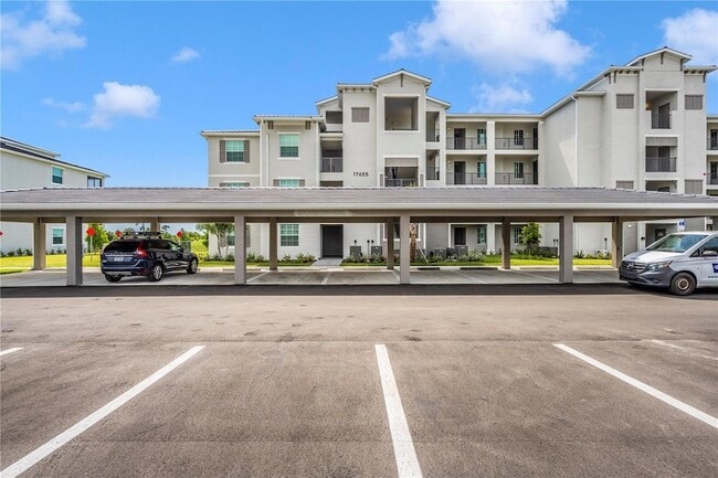 Building Photo - 17655 Opal Sand Dr Unit 208