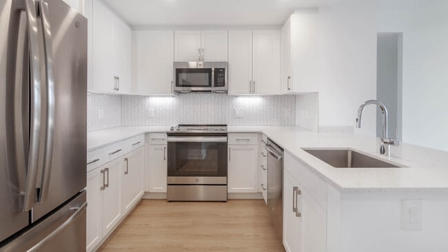Kitchen with Stainless Steel Appliances - Liberty Tower