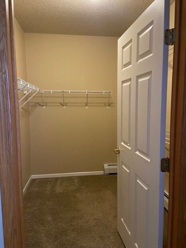 master closet - Hidden Cove Apartments
