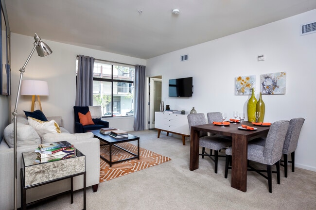 Classic Package I dining and living room with carpet (select homes) - Avalon at Cahill Park