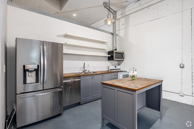 2BR, 2BA - 1348SF - Kitchen - Studios at Walnut