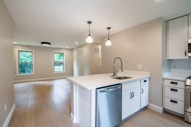 Welcome to Waterfront at the Strand, where modern design meets comfort. Enjoy bright, open living spaces with contemporary finishes and a stunning view. Schedule a visit today to see your future home! - Waterfront at the Strand