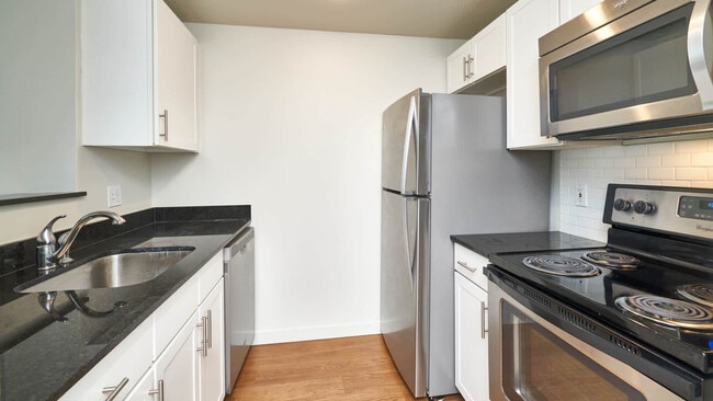 Kitchen with Stainless Steel Appliances - Harbor Steps