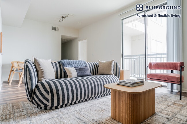 Building Photo - 11601 Century Oaks Terrace Unit FL2-ID295