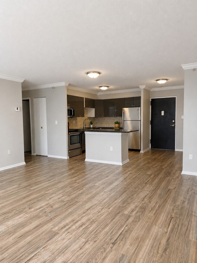 2BR, 1BA - 832SF - Living room into kitchen - 360 Main