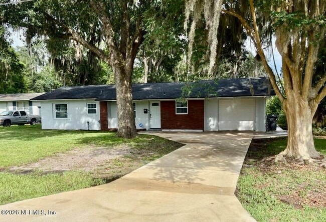 Building Photo - 7018 Bonnie Brae Ln