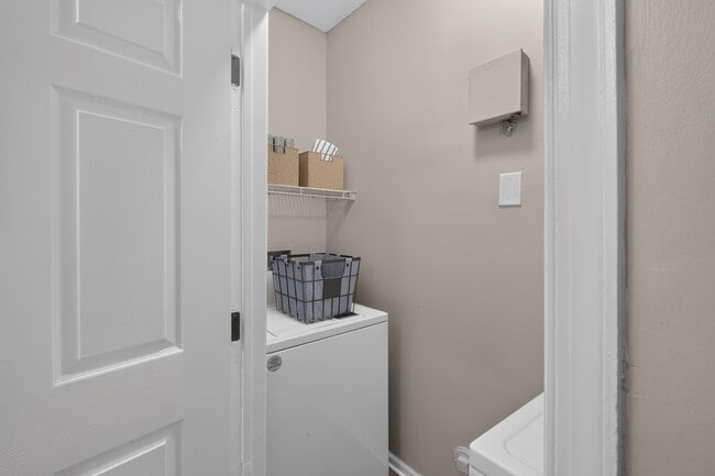 Effortlessly manage your laundry in this convenient in-unit washer and dryer setup, perfect for busy lifestyles. Enjoy modern living at Eagle Rock Apartments at Belcamp. Schedule a tour today to see this amenity in action! - Eagle Rock Apartments at Belcamp