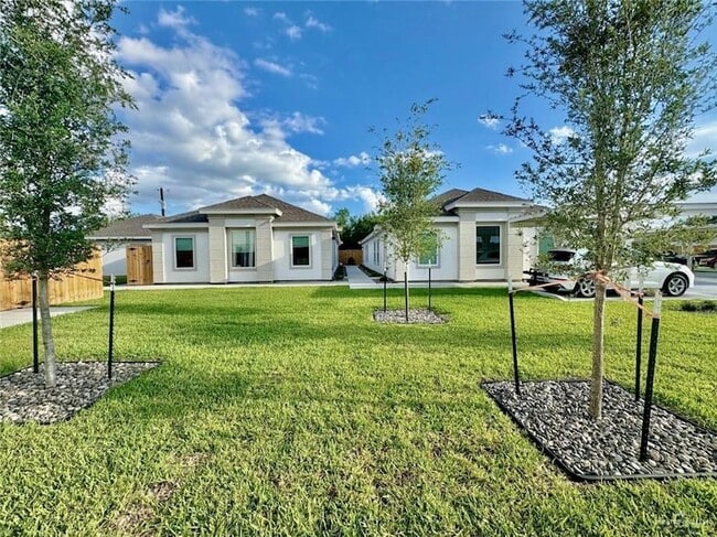 Building Photo - 7702 N 58th Ln Unit 3