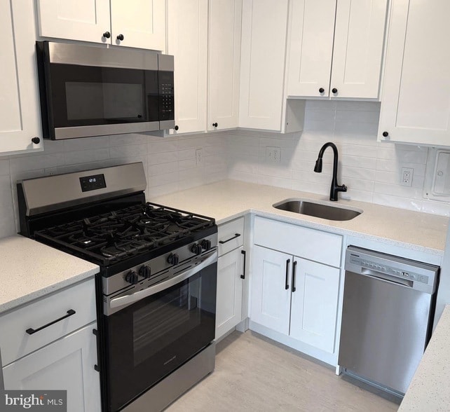 Building Photo - 922 24th St NW Unit 521