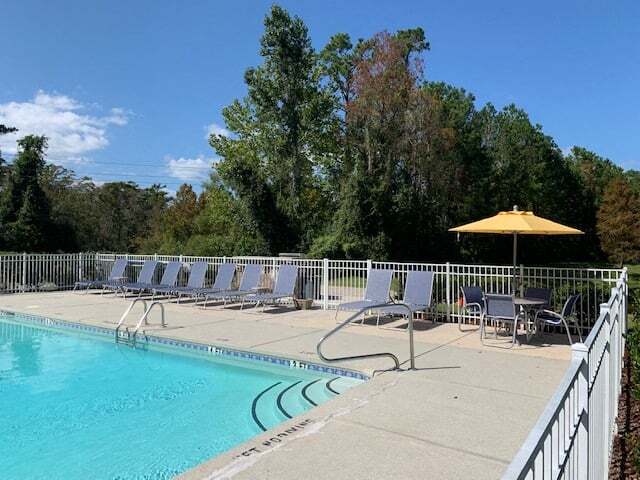 Sparkling swimming pool at Deerbrook Apartments in Wilmington, NC 28405 - Deerbrook Apartments