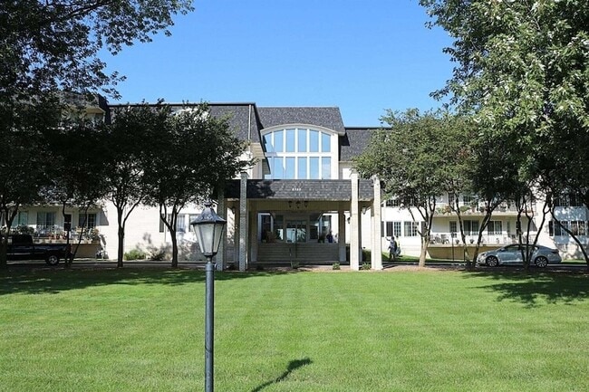 Building Photo - 8750 Harrison Ave Unit 411