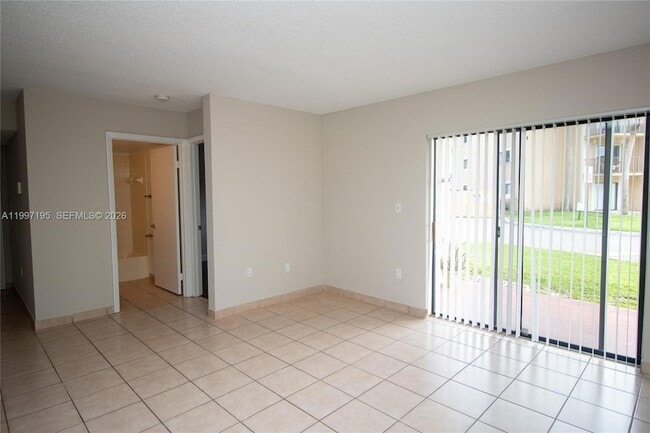 Photo - 9491 Palm Cir S Unit 101