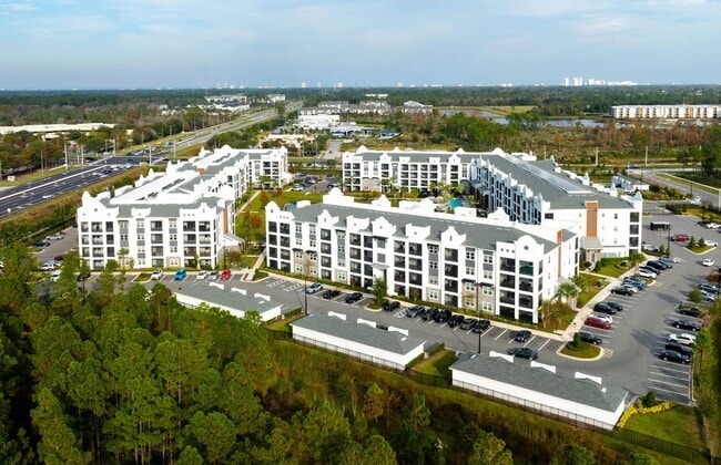 Elevate your lifestyle at The Edison Daytona Apartments, where modern living meets comfort. Enjoy stylish interiors, expansive green spaces, and convenient amenities designed for your everyday needs. Schedule a tour today and see for yourself! - The Edison Daytona Apartments