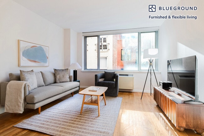 Building Photo - 120 W 21st St Unit FL5-ID2180