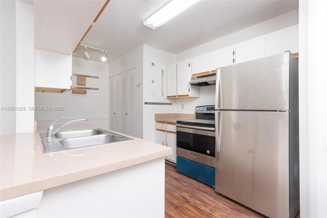 Building Photo - 18310 NW 68th Ave Unit L