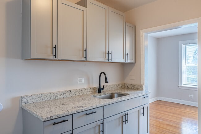 3BR, 1BA - 1,080SF - Kitchen - 7526-36 S Colfax Ave