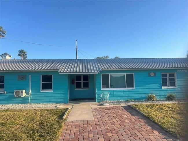 Building Photo - 13406 Boca Ciega Ave Unit 1