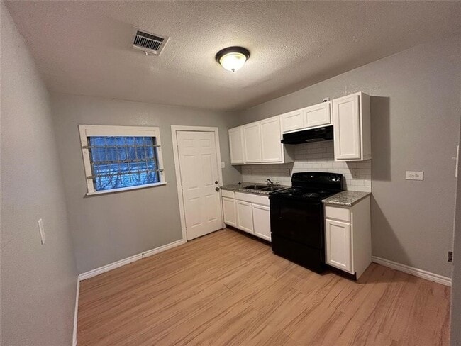 Photo - 6818 Weston St Unit 1