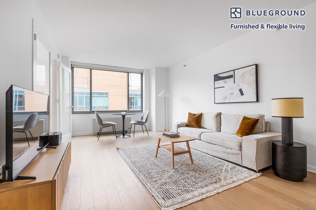 Building Photo - 535 W 23rd St Unit SI FL14-ID2043