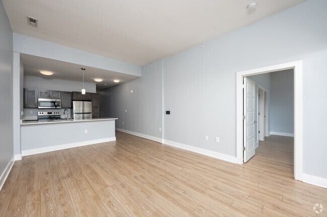 Lily - 1BR, 2BA - 1,000SF - Living Room - The E'Laan