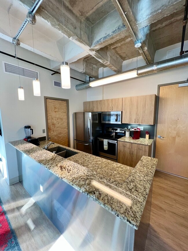 Kitchen - #406 - Carnegie Centre Historic Lofts