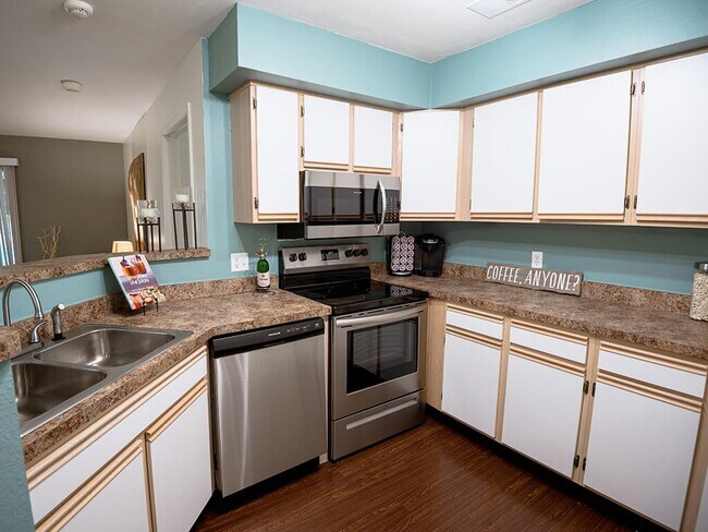 Kitchen with Stainless Steel Appliances - Woodland Ridge