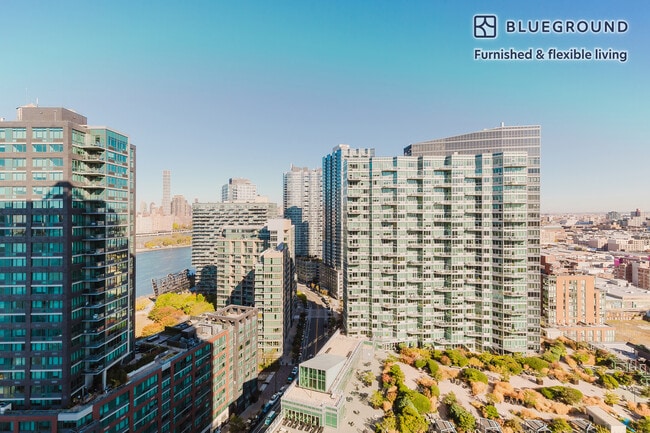 Photo - 4-75-75 48th Ave Unit FL26-ID1612