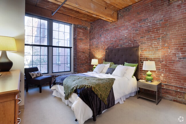 1BR, 1BA - 888SF - Bedroom - The Apartments at Boott Mills