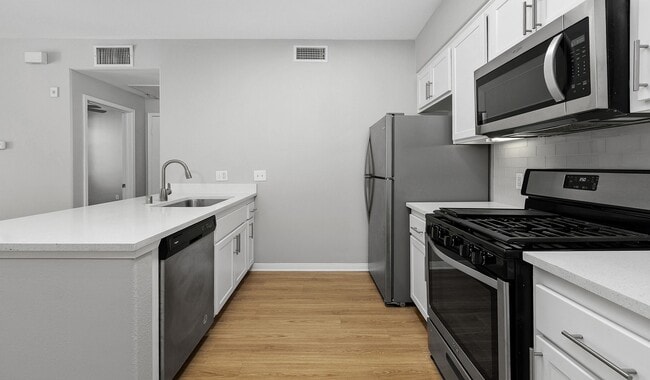 Create meals and memories in your modern kitchen. - Lasselle Place