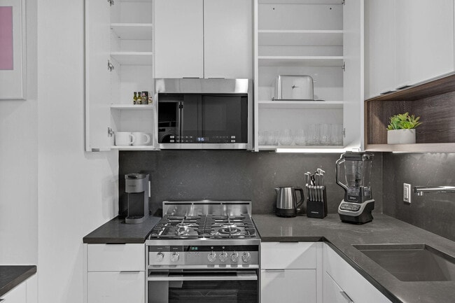 Photo - 64B W 37th St Unit FL21-ID1224044P