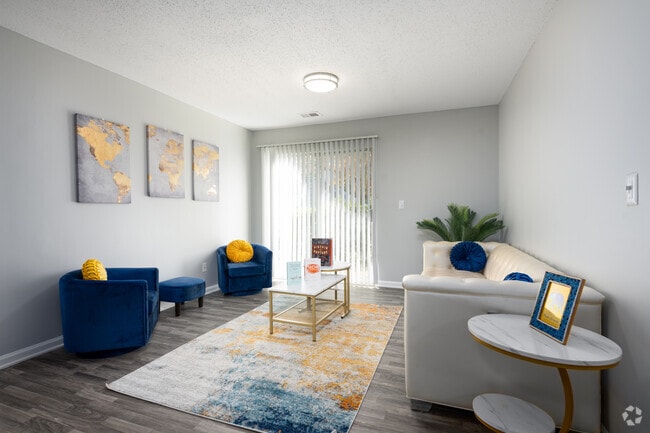 2BR, 2BA - 928SF - Living Room - Sedgefield Square