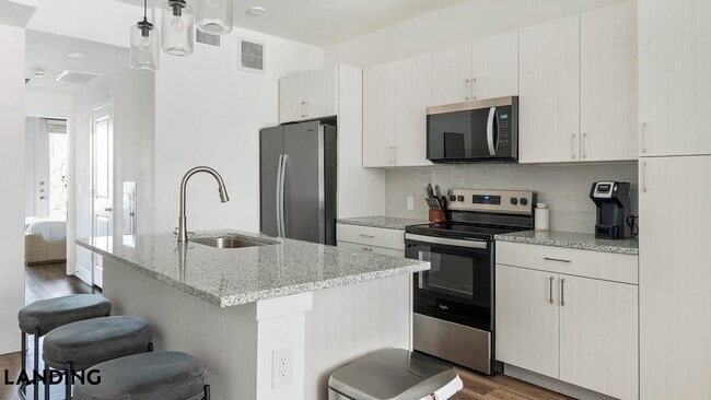 Building Photo - 6525 Ed Bluestein Blvd Unit 8206