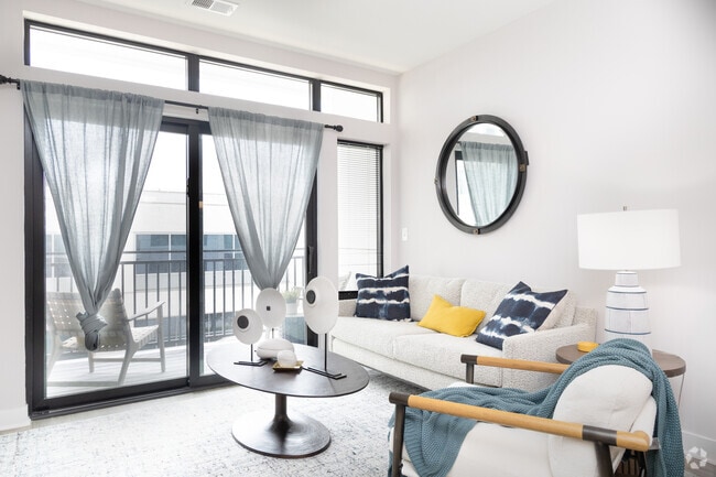 1BR, 1BA - 664SF - Leo - Living Room - Gravity on 400