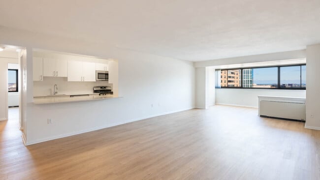 Living and Dining Room with Hard Surface Flooring - Emerson Place
