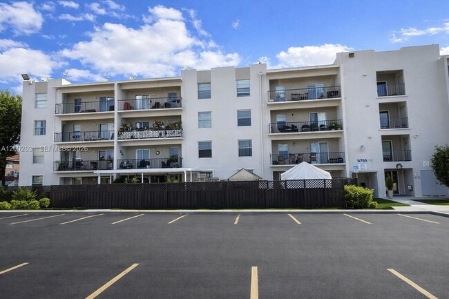 Building Photo - 5755 W 20th Ave Unit 406