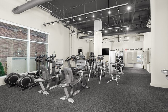 State-of-the-Art Fitness Center and Yoga Studio - Madamore