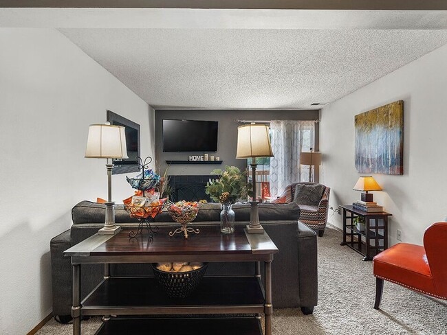 Spacious Living Room - The Retreat at Woodridge Apartments