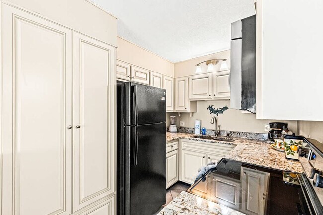 Photo - 8743 Thomas Dr Unit SI FL8-ID1354978P