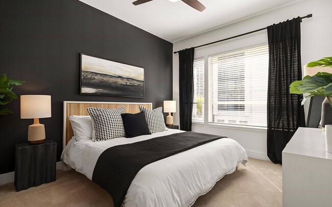 Modern Bedroom Featuring Statement Wallpaper and Generous Windows - Tens on West